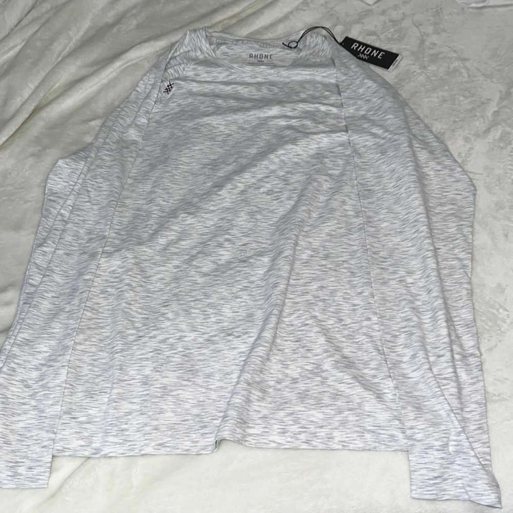 Rhone size medium long sleeve with small detail on one shoulder